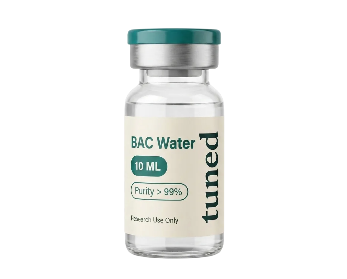 Clear glass vial with a teal cap, silver collar and cream label